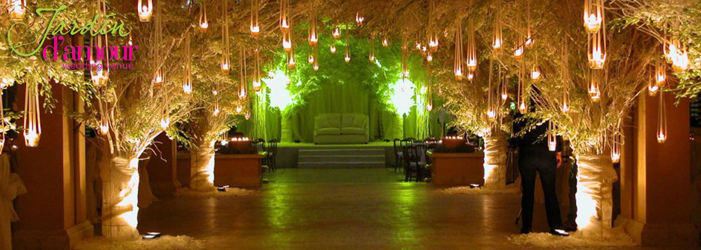 Reception tables dressed in white with golden accents
